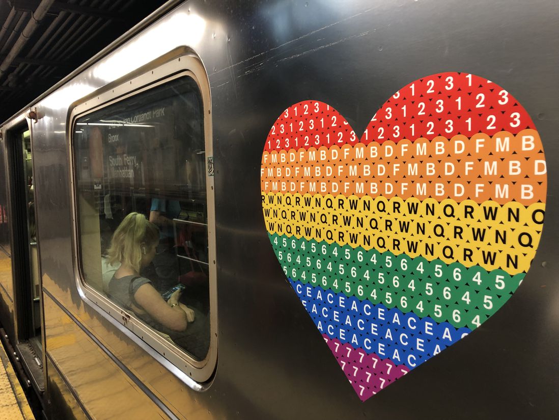 The MTA Pride logo seen on the 1 train (Photograph © Howard Sherman)